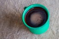 Green mug of hot chocolate