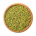 Green mung bean in wooden bowl, isolated on white background. Top view Royalty Free Stock Photo