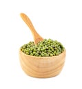 Green mung beans with bowl and wooden spoon isolated on white background Royalty Free Stock Photo