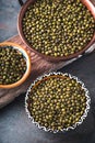 Green mung beans in bowls on wooden stand Royalty Free Stock Photo