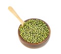 Green mung beans with wooden spoon and bowl isolated on white background Royalty Free Stock Photo