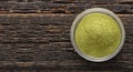 Green and natural moringa powder in a bowl - Moringa oleifera Royalty Free Stock Photo