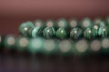 Green necklace of beads of malachite Royalty Free Stock Photo