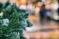Green needles on spruce, pine branches. Abstract blurred holiday colorfur background with Bokeh. Selective focus. Winter Royalty Free Stock Photo