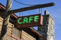 Green Neon Cafe Sign on Post Royalty Free Stock Photo