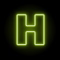 Neon letter H on black