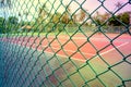 Green Net in front of Tennis Court Royalty Free Stock Photo