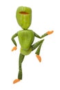 Green ninja made of vegetables kicks with a knee