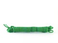 coiled green nylon rope isolated on white background