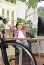 Green office: businessman with bicycle at office