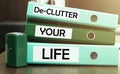 3 green office folders with text De-Clutter Your Life Royalty Free Stock Photo