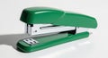 Green office stapler bright green stapler is presented as a single item on a clean isolated on white background Royalty Free Stock Photo