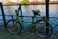 a green old bike turned into artwork