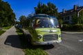 Green old classic retro bus Setra S6 the on the city street of Munich