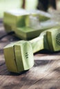 Green old-fashioned telephone on wooden background Royalty Free Stock Photo