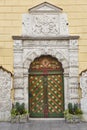 Green old fashioned wooden door on stone facade. Tallinn Royalty Free Stock Photo