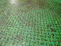 Green old grungy metal floor seamless of steel sheet metallic. Rusty green steel plate texture Royalty Free Stock Photo