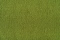 Green olive background from a soft wool textile material closeup. Fabric with natural texture Royalty Free Stock Photo