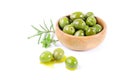 Green olives and aromatic herbs isolated on white background.