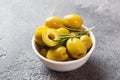 Green olives in bowls on dark table. Copy space Royalty Free Stock Photo