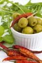 Green olives, chili, basil and rucola Royalty Free Stock Photo
