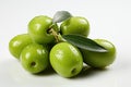 Green olives close-up isolated on a white background. Royalty Free Stock Photo