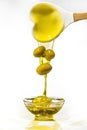 Green olives and extra virgin olive oil with splash Royalty Free Stock Photo