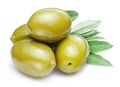 Green olives with leaves on white background. Close-up Royalty Free Stock Photo