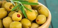 Green olives with rosemary, mediterranean organic cooking