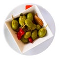 Green olives served with pepper and garlic