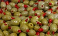 Green olives stuffed with red chili pepper Royalty Free Stock Photo