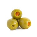 Green olives stuffed with red paprika isolated on white Royalty Free Stock Photo