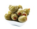 Green olives stuffed with red paprika isolated on white Royalty Free Stock Photo