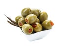 Green olives stuffed with red paprika isolated on white Royalty Free Stock Photo