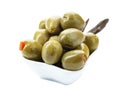 Green olives stuffed with red paprika isolated on white Royalty Free Stock Photo