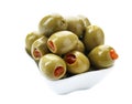 Green olives stuffed with red paprika isolated on white Royalty Free Stock Photo
