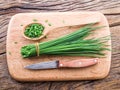 Green onion - chives on the wooden table Royalty Free Stock Photo