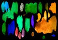 Green, orange, blue, red watercolor brush strokes on black background. Bright abstract watercolor texture. Royalty Free Stock Photo