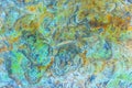 Green, orange, blue and yellow sedimentary rocks - colourful rock layers formed through cementation and deposition - abstract Royalty Free Stock Photo