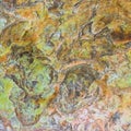 Green, orange, blue and yellow sedimentary rocks - colourful rock layers formed through cementation and deposition - abstract Royalty Free Stock Photo