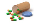 Green and orange capsules on white background Royalty Free Stock Photo