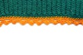 Green orange crocheted textile white background