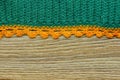 Green orange crocheted textile background