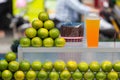 Green orange pile and juice Royalty Free Stock Photo