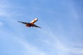 Green orange white supertanker jet going to fight wildfires in Nevada and California