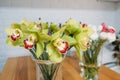 Green orchid bouquet close up, flower arrangement in the shop. Gorgeous green Cymbidium Orchid Plant. Cymbidium Orchid Bunch, Royalty Free Stock Photo