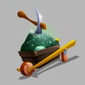 Green ore in a wheelbarrow with a pickaxe. Royalty Free Stock Photo