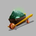 Green ore in a wheelbarrow. Royalty Free Stock Photo