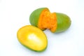 The green orenge slice half cutt mango isolated on white background Royalty Free Stock Photo