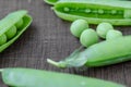 Green organic peas on wooden background Royalty Free Stock Photo